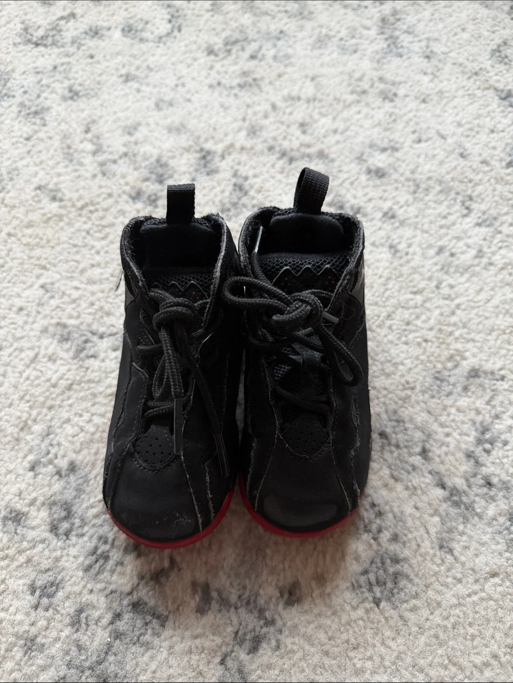Jordan Kids size 7C shoes. Shows signs of wear.